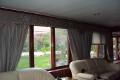 Custom cornice with stationary tie backs.