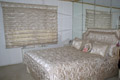 Roman-shade-with-matching-bedspread,-pillows-and-headboard.jpg