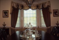 Kingston Swags with center palmuts and stationary tie backs.