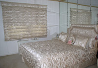 Roman-shade-with-matching-bedspread,-pillows-and-headboard.jpg